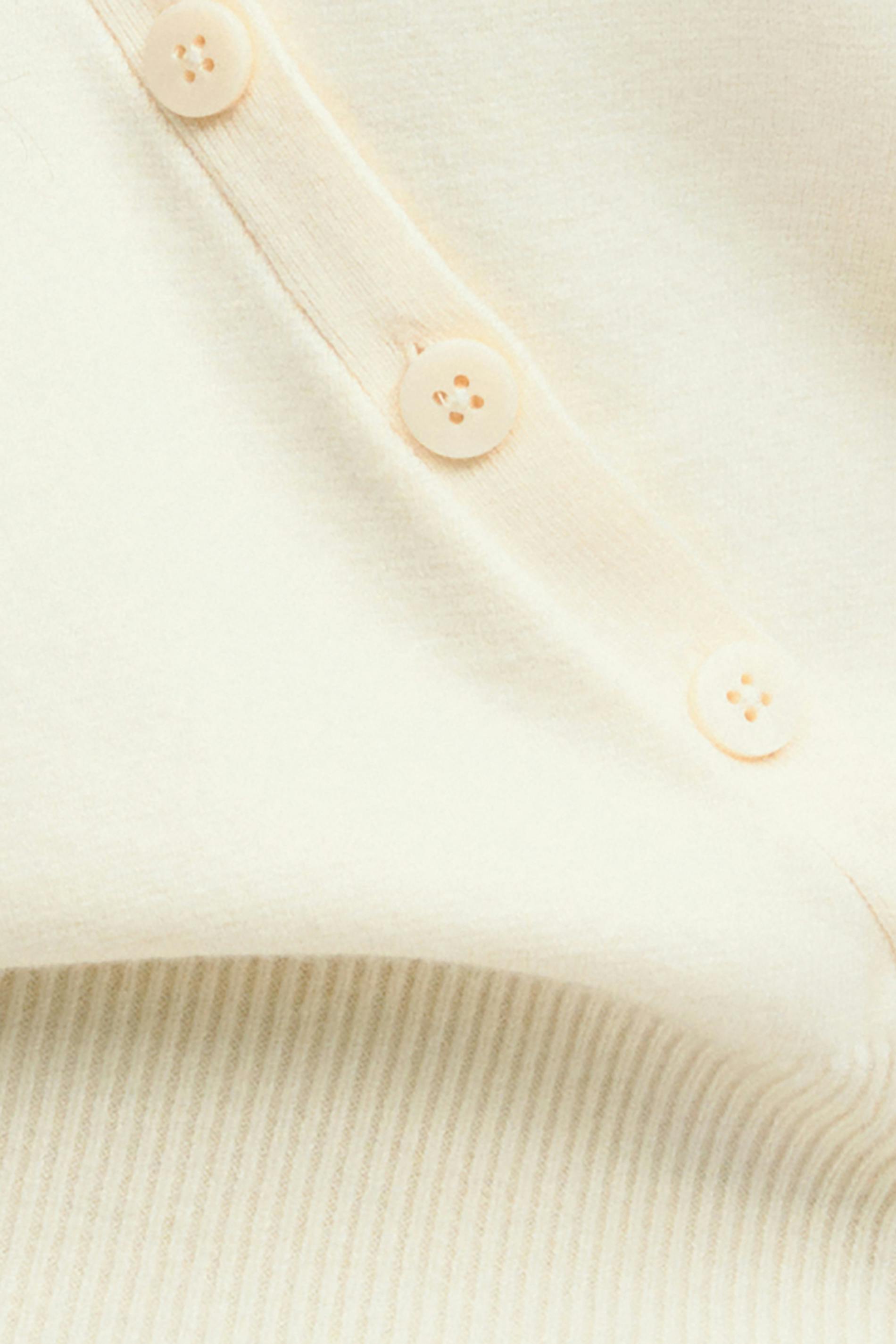 Asymmetric knitted cardigan - White - Women - Gina Tricot