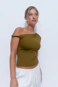 Asymmetric Micro Top
