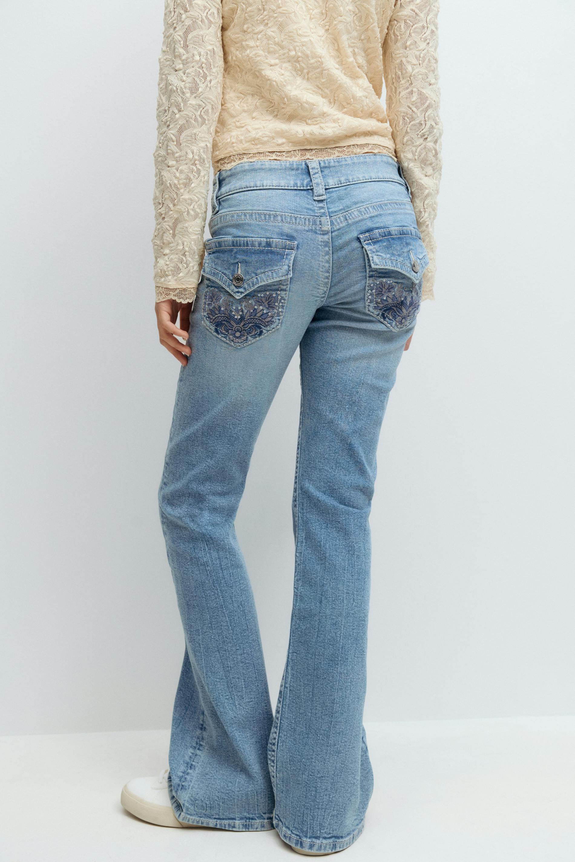Decorated low flare jeans Blue Gina Tricot