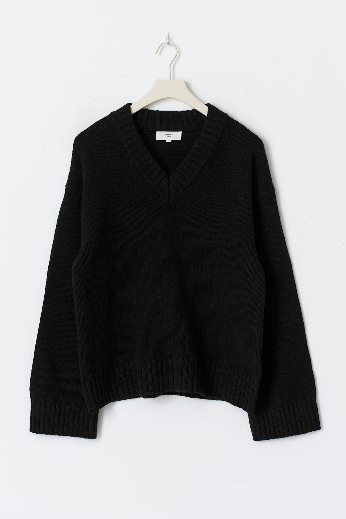 V-neck knitted wool sweater - Black - Women - Gina Tricot