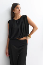 Bubble hem knitted top