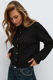 Turtleneck knitted cardigan