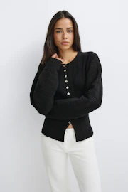 Shaped knitted cardigan