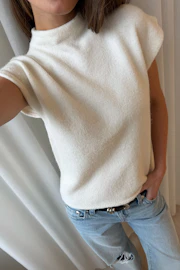 Knitted funnel neck top