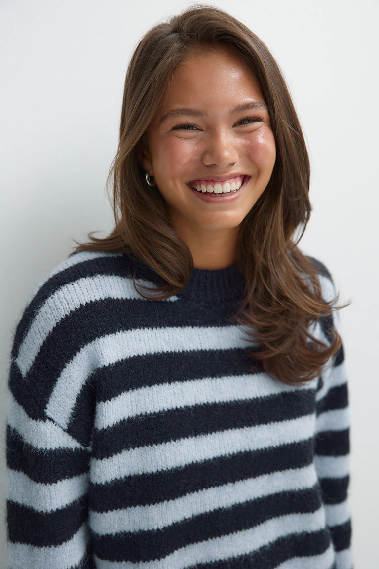 StyleColorSupplier 12006: navy and light blue striped sweater.