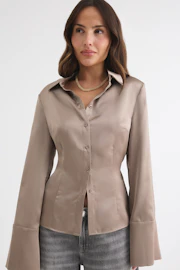 Shoulder pad shaped shirt