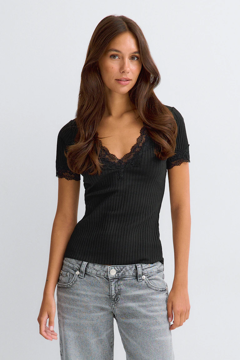 Black ribbed lace-trim top with short sleeves and a V-neckline.