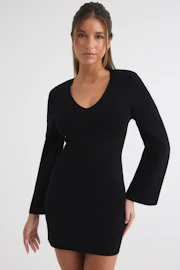 Knitted shoulder pad dress