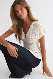 Lace peplum top