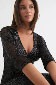 Beaded quarter sleeve top